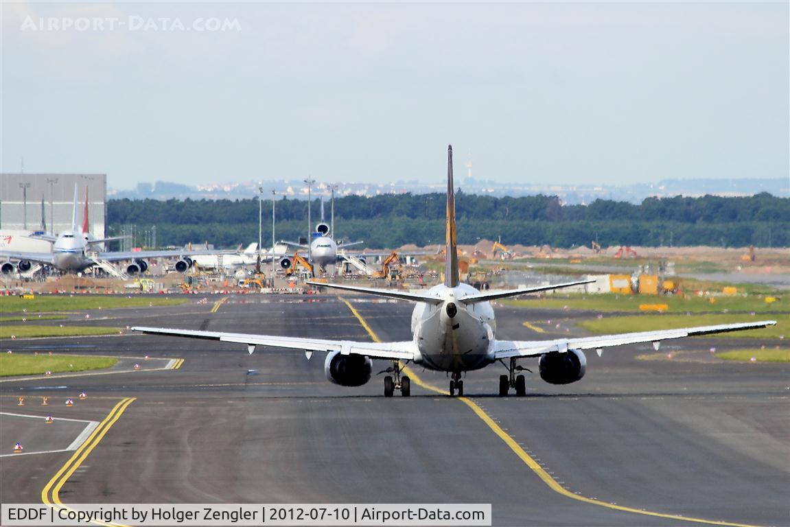 Frankfurt International Airport, Frankfurt am Main Germany (EDDF) - Looks like a scene from wild West - a good boy (in front) versus two bad boys (farther back).....