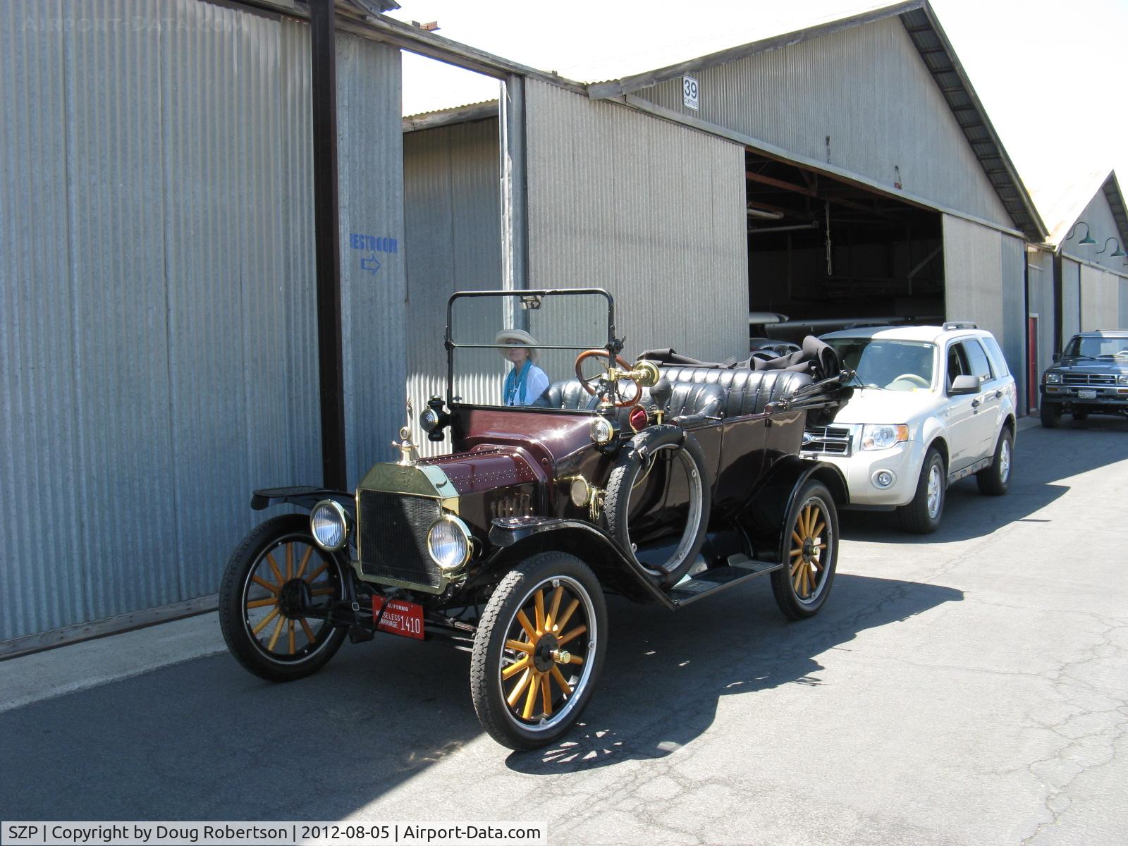 Santa Paula Airport (SZP) - First Sunday Aviation Museum of Santa Paula Open House & Fly-In invites car clubs-this is a restored Ford Model T Phaeton from a California Model T Club. 