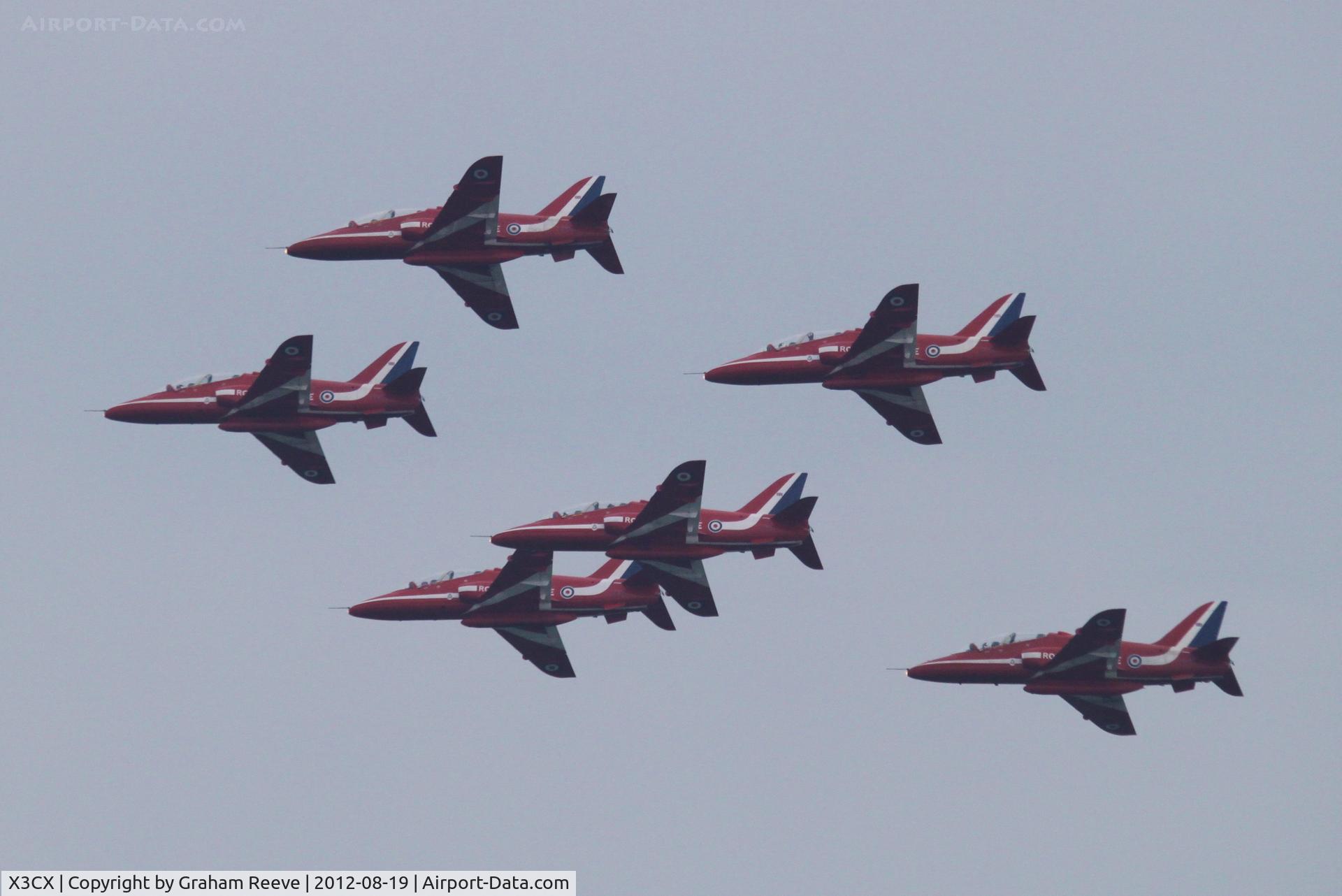 X3CX Airport - Red Arrows display at a wet and windy Cromer Carnival 2012.