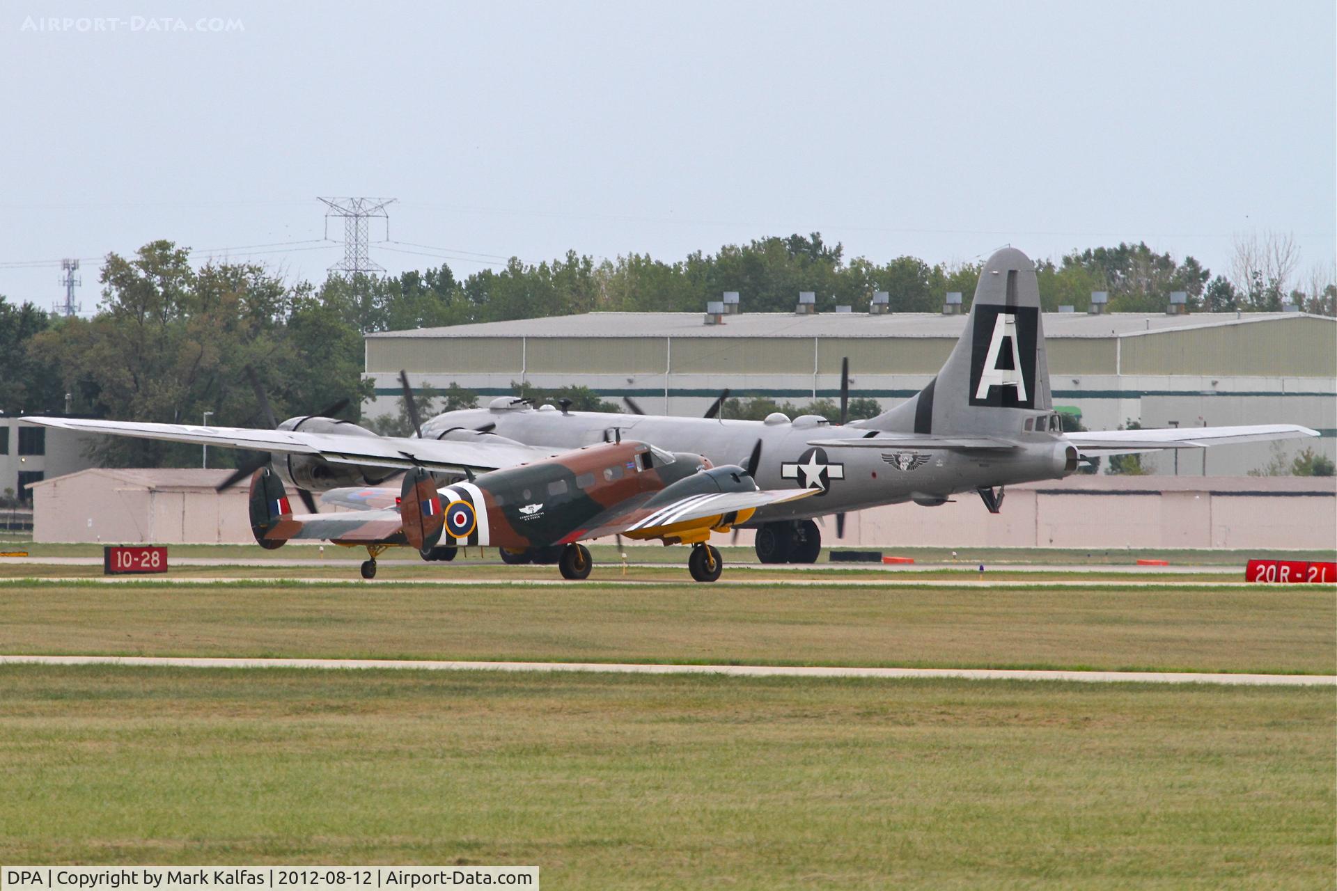 Dupage Airport (DPA) - N70GA on TWY G following N529B to TWY W at DuPage for a RWY 19R departure.