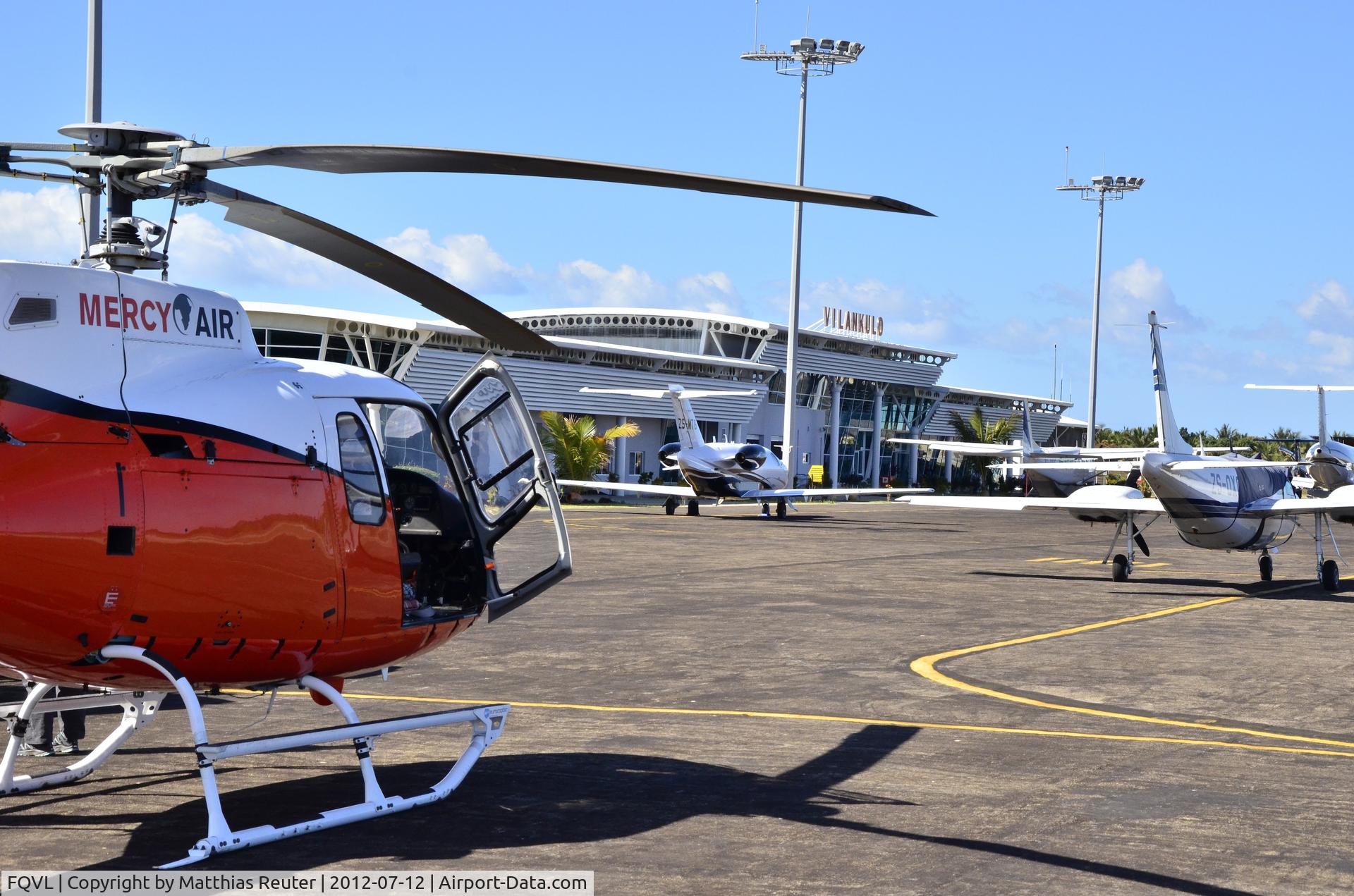 Vilankulo Airport, Vilankulo Mozambique (FQVL) - Vilankulos' busy apron with new terminal building in background.
