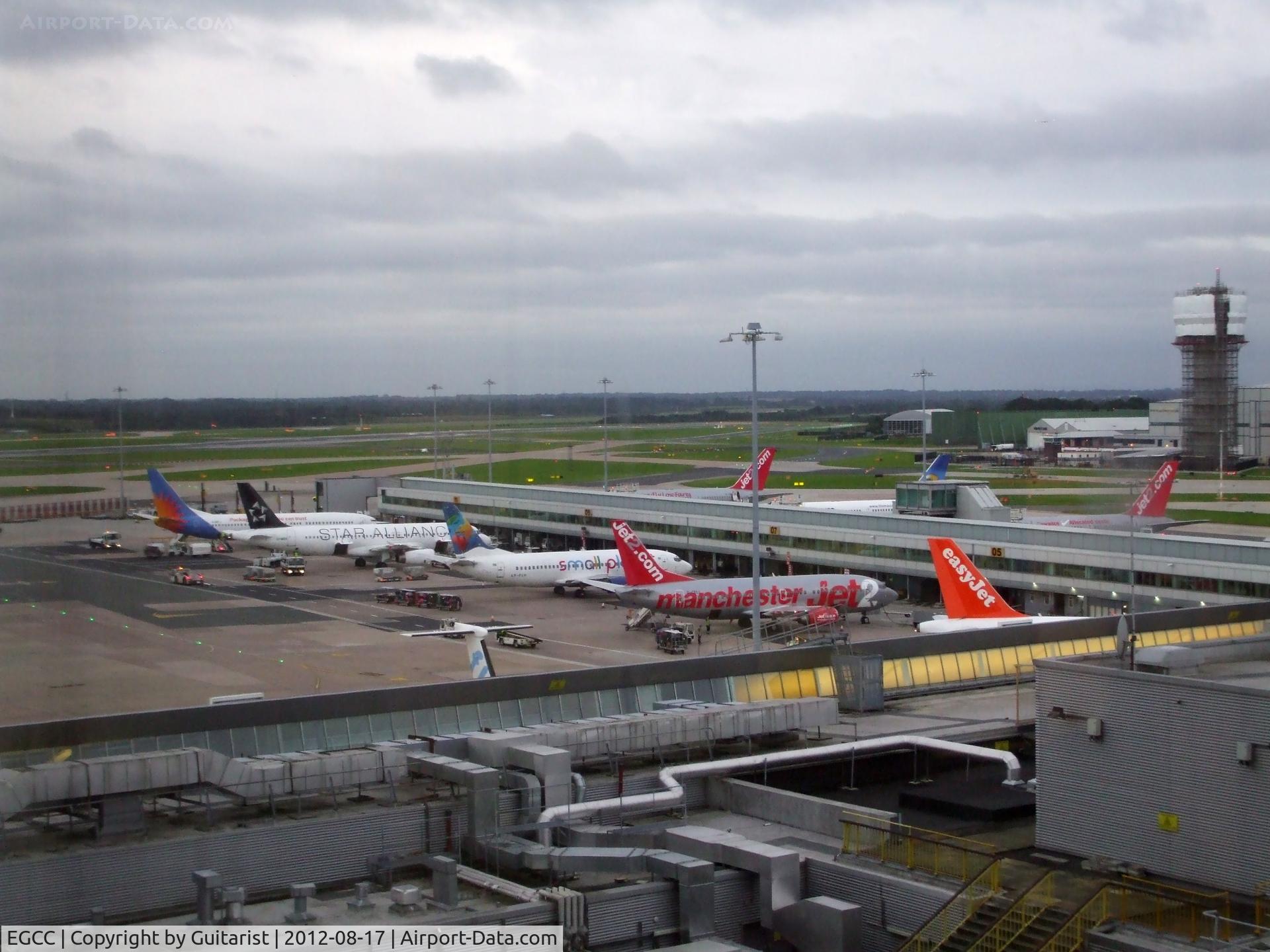 Manchester Airport, Manchester, England United Kingdom (EGCC) - A wet Friday morning at Manchester