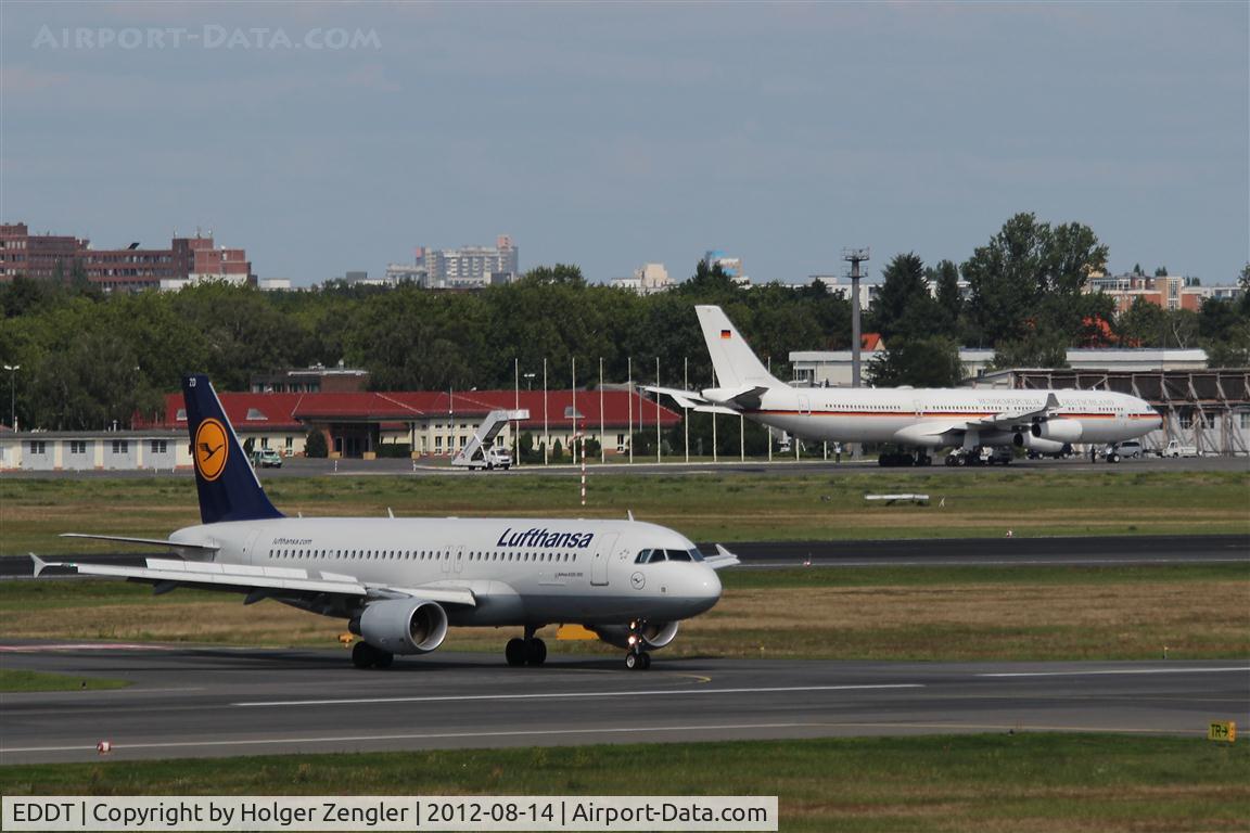 Tegel International Airport (closing in 2011), Berlin Germany (EDDT) - The TXL way: Arrival from rwy 08L is crossing rwy 08R for taxiing to gate 9.