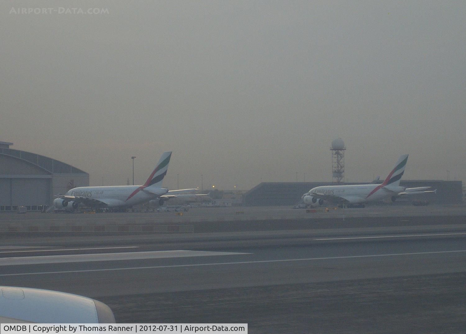 Dubai International Airport, Dubai United Arab Emirates (OMDB) - two Emirates A380s