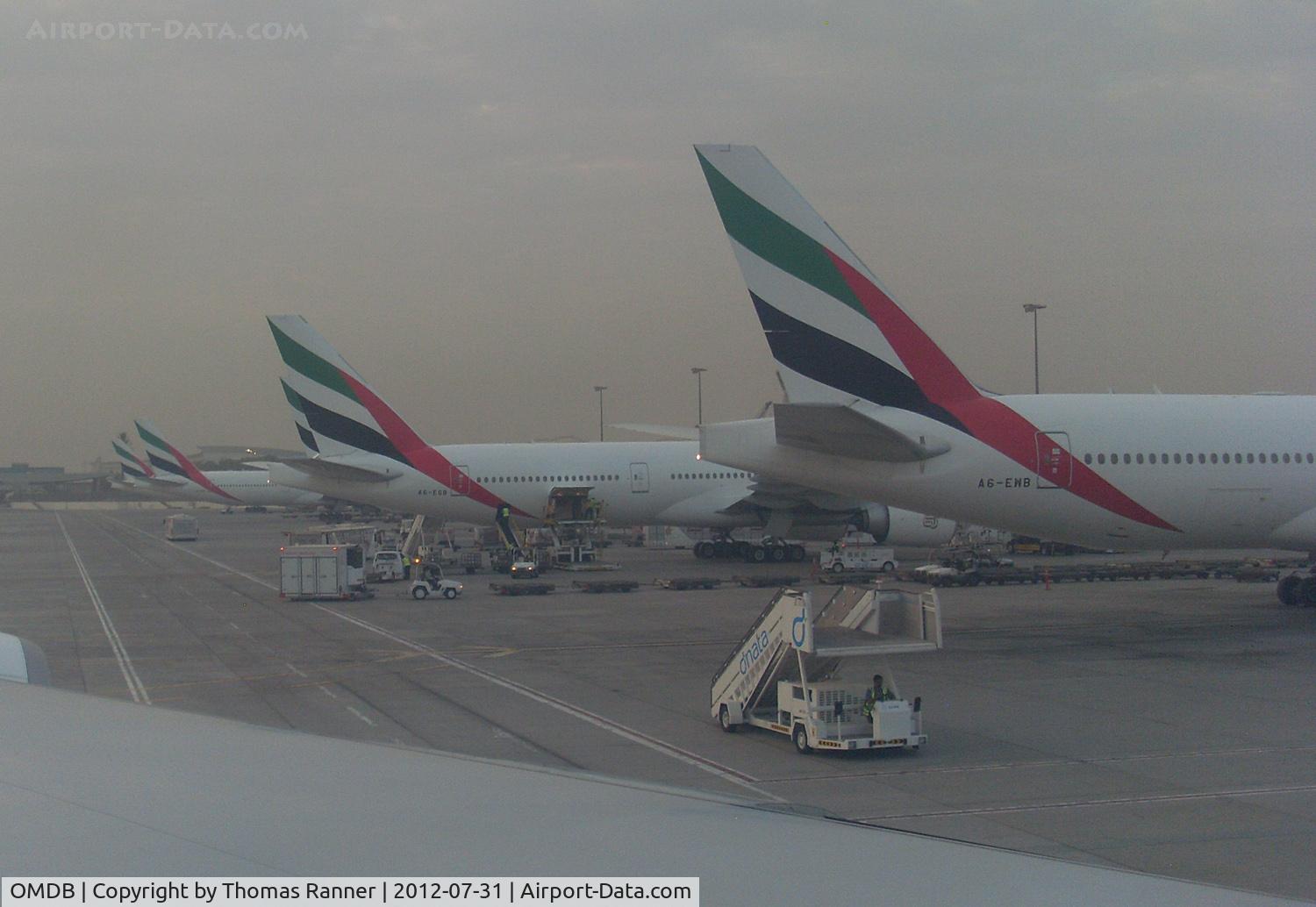 Dubai International Airport, Dubai United Arab Emirates (OMDB) - a few Emirates planes