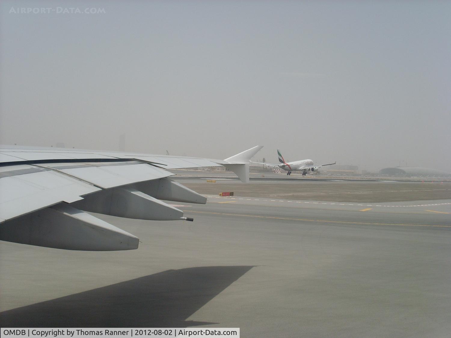 Dubai International Airport, Dubai United Arab Emirates (OMDB) - Emirates Airbus A330 shortly before Touchdown