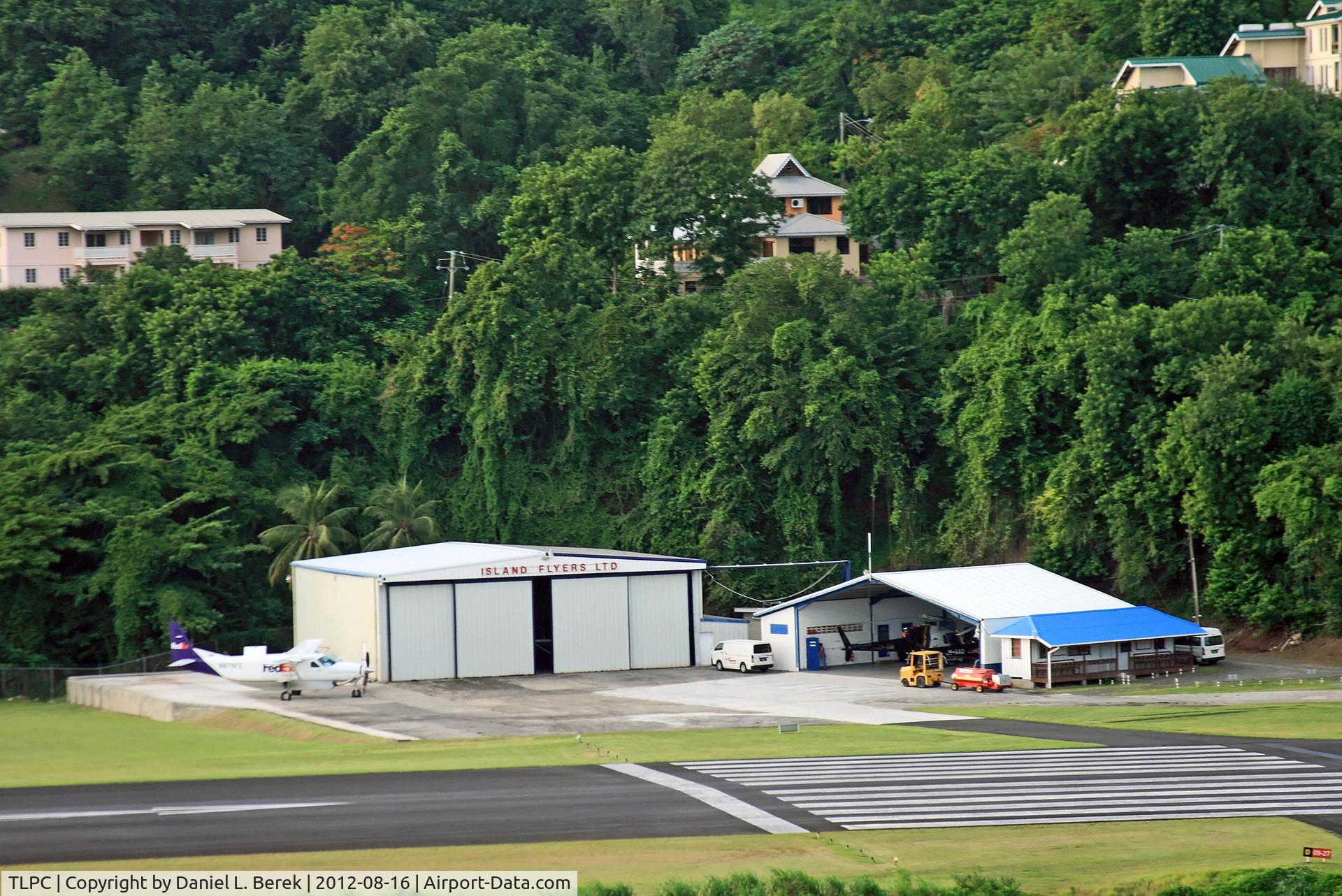 George F. L. Charles Airport (formerly Vigie Airport), Castries, Saint Lucia Saint Lucia (TLPC) - This area is the FBO at George F. L. Charles Airport, Castries, St. Lucia; it is located opposite the passenger terminal and general aviation ramp and due south of the freight ramp.