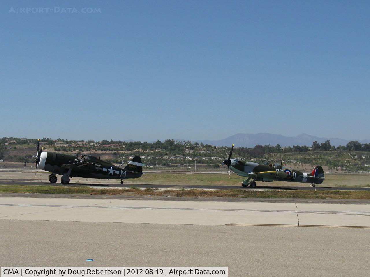Camarillo Airport (CMA) - Real Thunderbolt N3395G and replica Spitfire N1940K taxi to 26