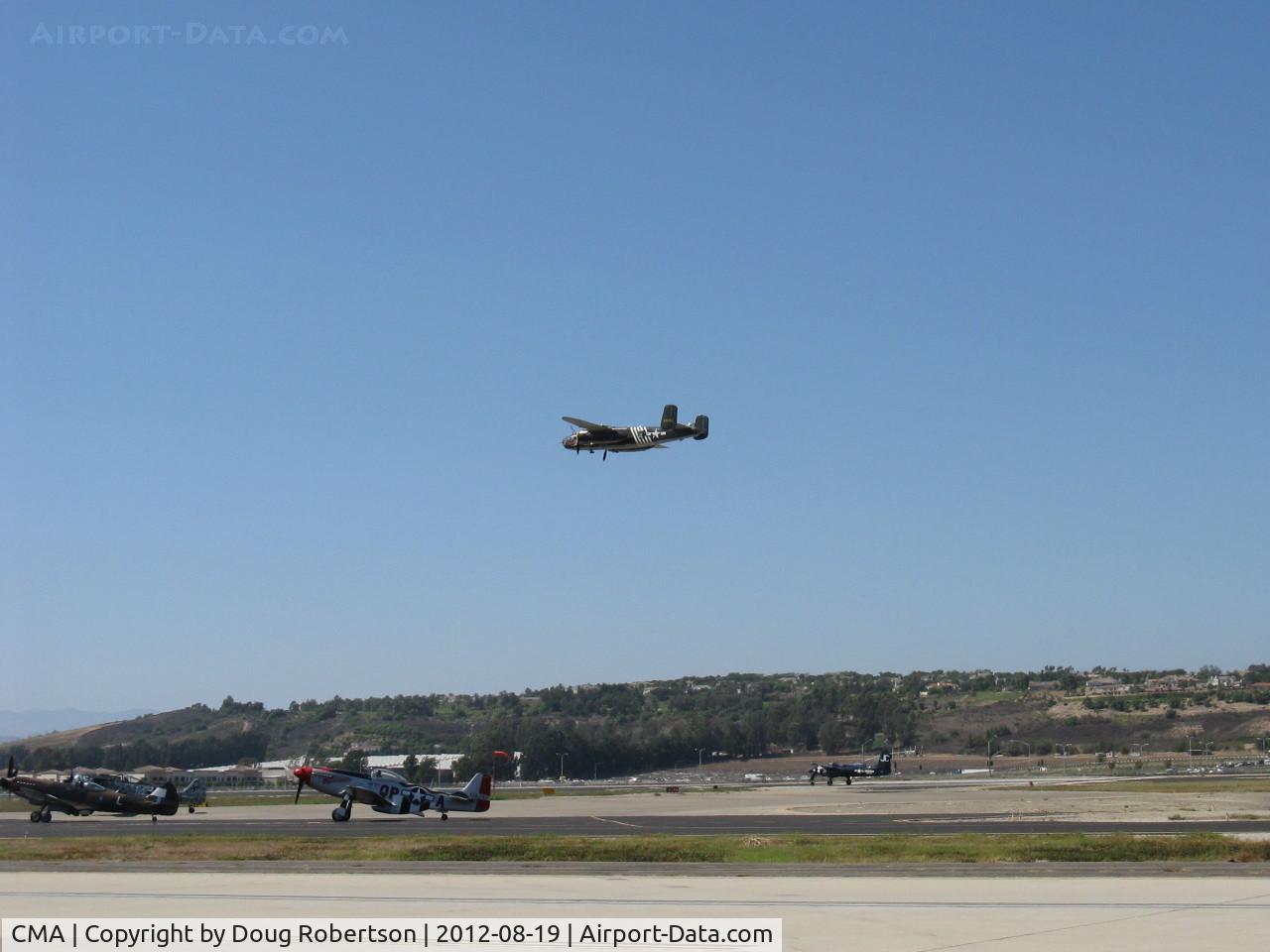 Camarillo Airport (CMA) - TB-25N Mitchell N30801 overflight 26 with N909TC F7F Tigercat holding short 26