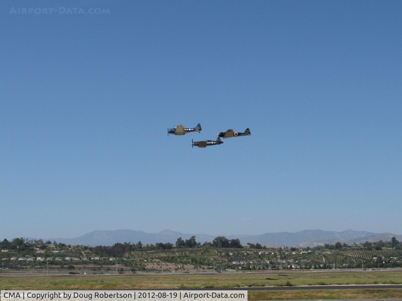 Camarillo Airport (CMA) - Douglas SBD Dauntless N670AM, Chance-Vought F4U-1 Corsair N83782 and Mitsubishi A6M Zero-Sen N712Z in formation over 26, Wings Over Camarillo Airshow 2012