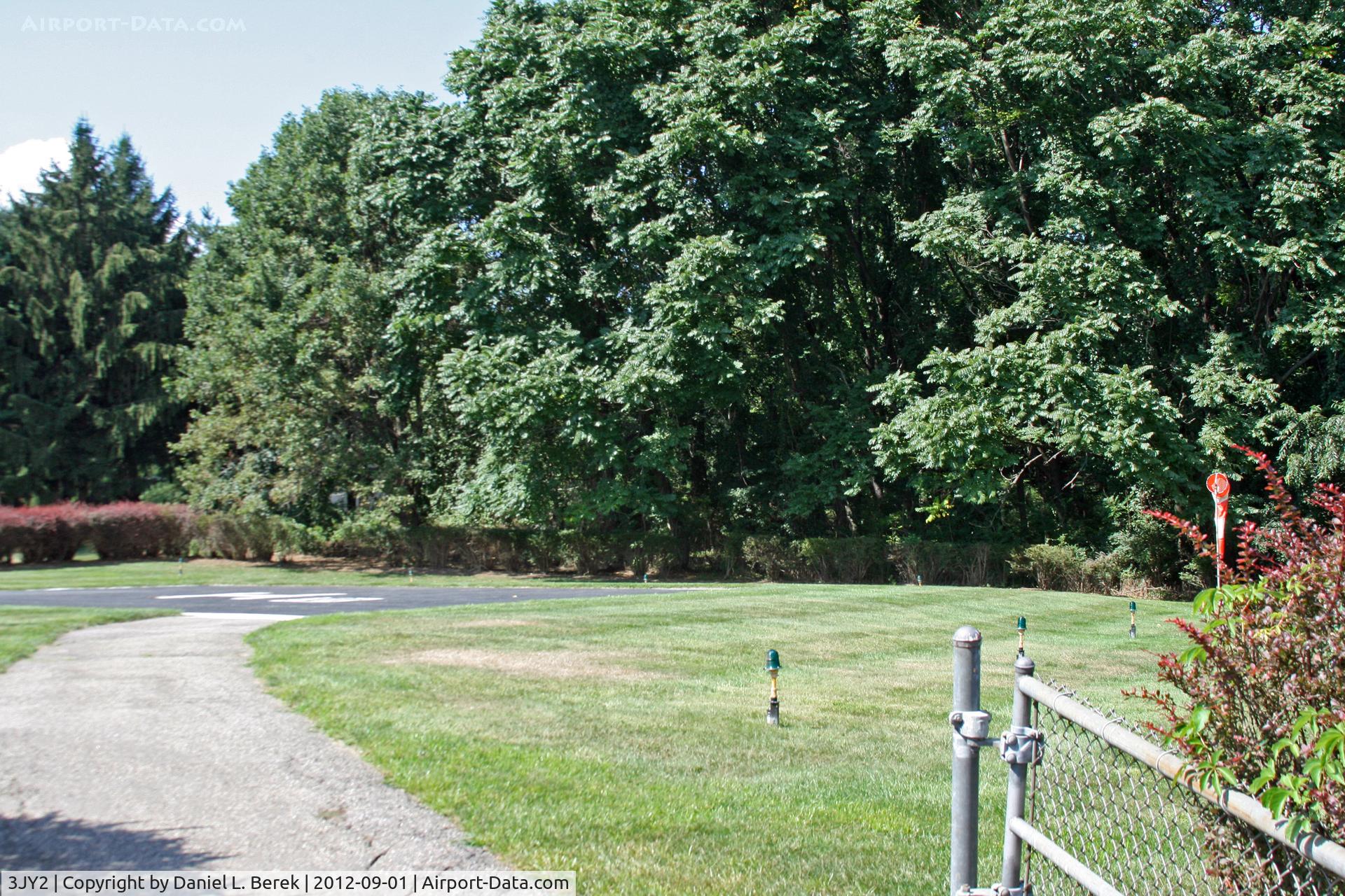 Cherry Hill Heliport (3JY2) - With its colorful surrounding shrubbery, this has to be one of the nicest little heliports around.