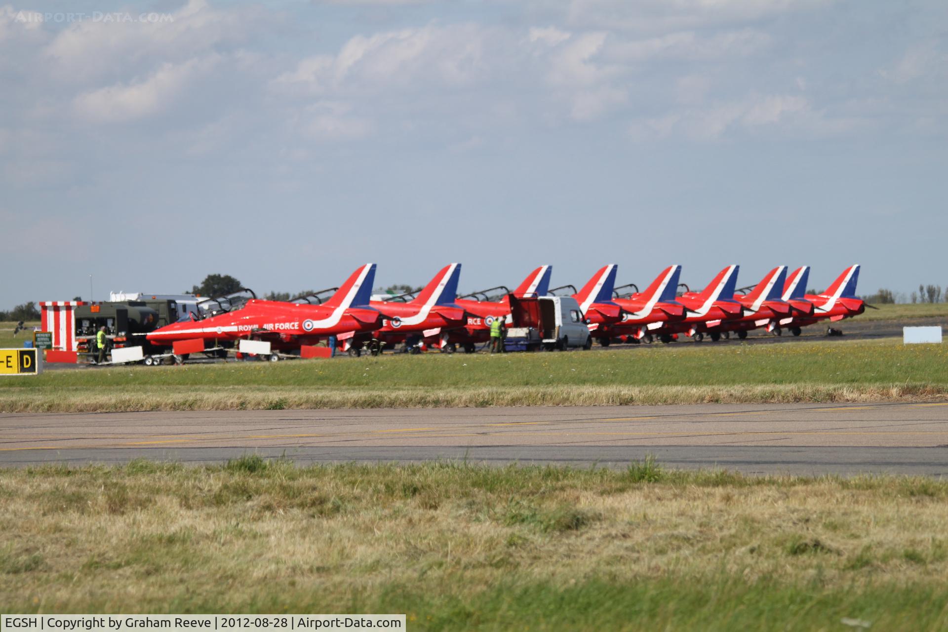 Norwich International Airport, Norwich, England United Kingdom (EGSH) - The Red Arrows parked on Delta at Norwich.