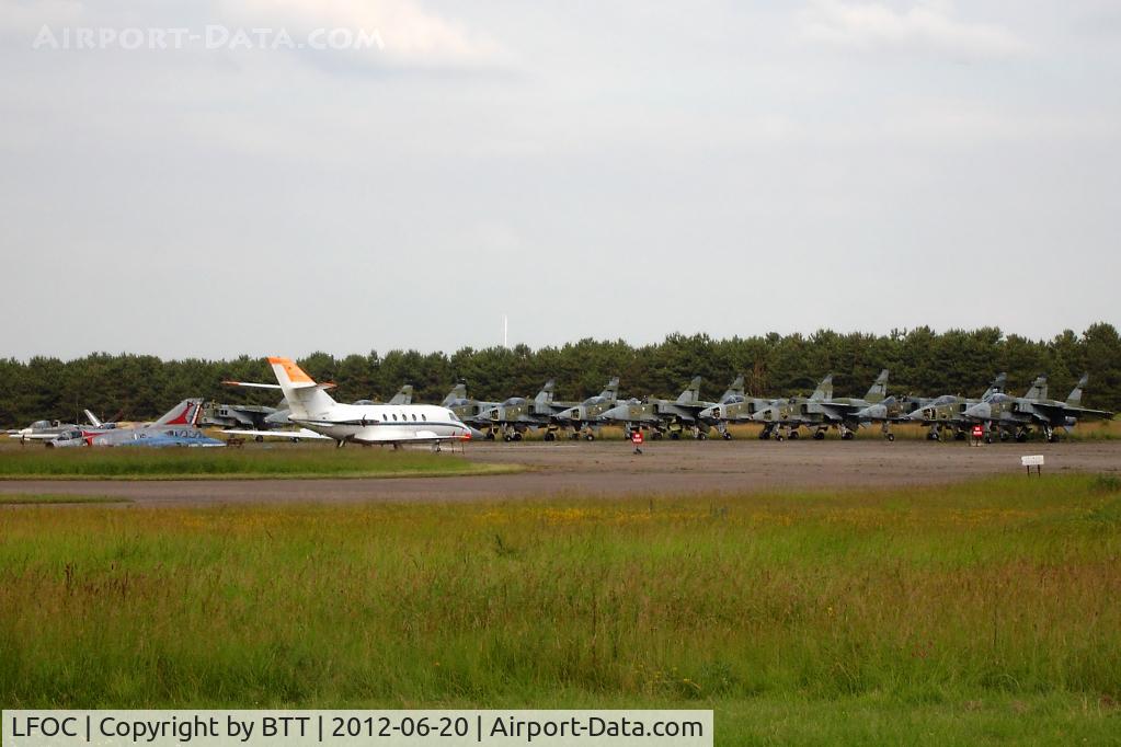 Châteaudun Airport, Châteaudun France (LFOC) - Storage area with 12 SEPECAT Jaguar A, 1 Mirage III, 1 Falcon 20 and 2 CM170 Fouga Magister one with French Aerobatic Team deco