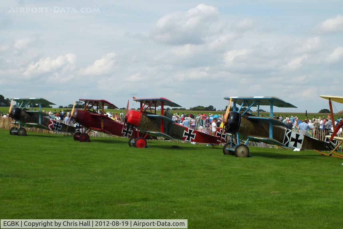 Sywell Aerodrome Airport, Northampton, England United Kingdom (EGBK) - four Fokker DR.1 replicas at the 2012 Sywell Airshow