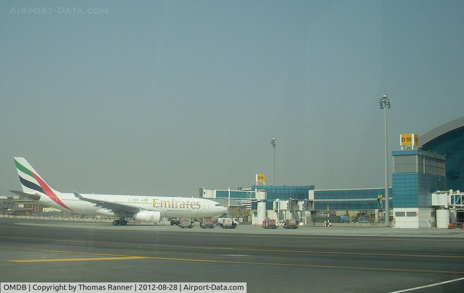Dubai International Airport, Dubai United Arab Emirates (OMDB) - Emirtaes A330 parked at the new terminal