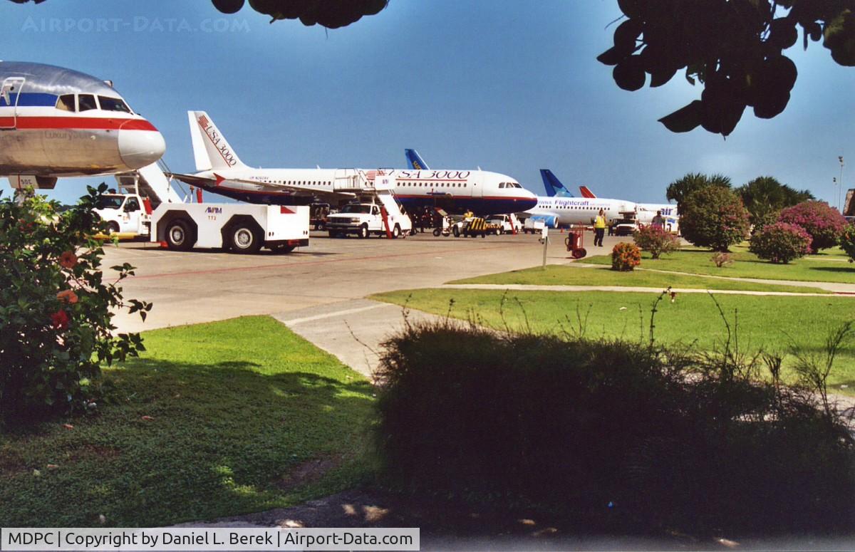 Punta Cana International Airport, Punta Cana / Higüey Dominican Republic (MDPC) - A host of airliners line up bringing tourists to and from this tropical paradise.