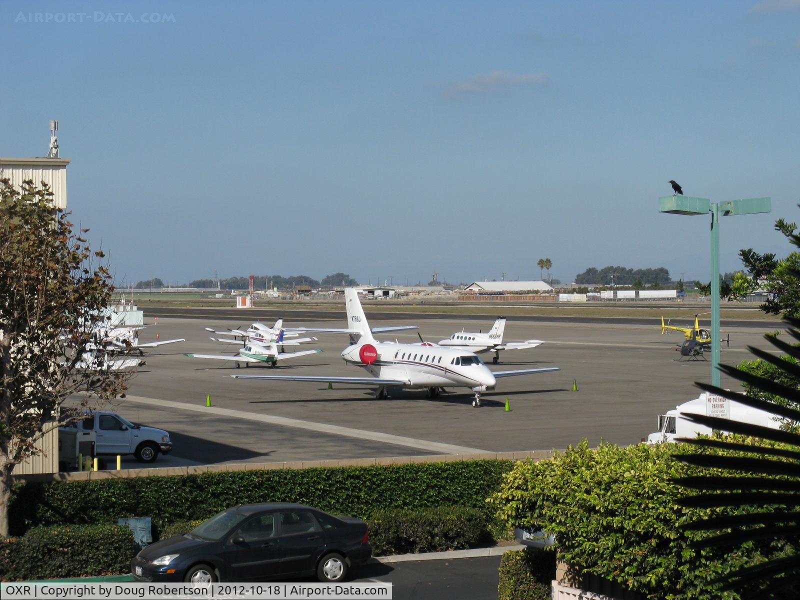 Oxnard Airport (OXR) - Golden West's General Aviation ramp. Formerly Million Air at this site. Before that-Valenti Aviation Cessna Dealer hangar consumed by fire with loss all aircraft.