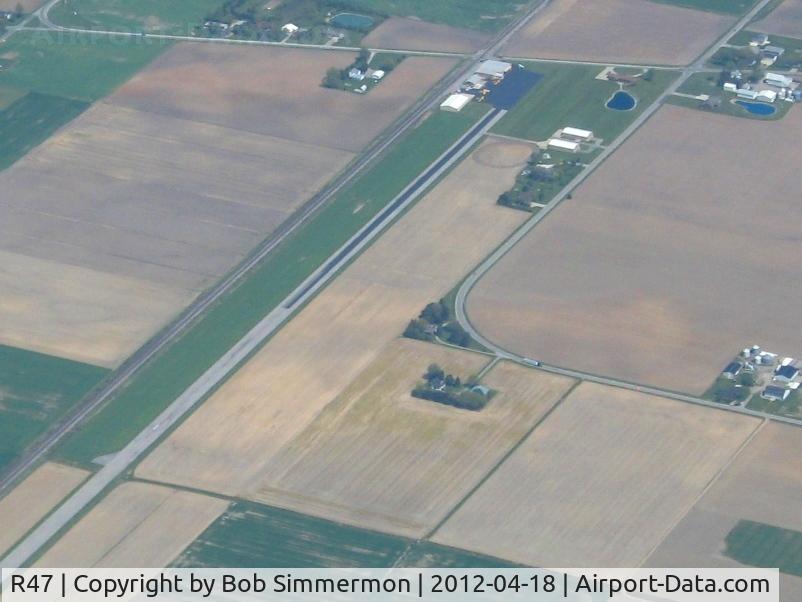 Ruhe's Airport (R47) - Looking NE w/crop dusters on the ramp.