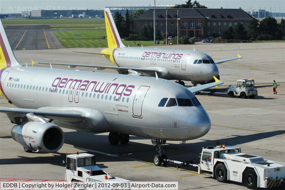Berlin Brandenburg International Airport, Berlin Germany (EDDB) - Push back ballet performed by Delta-Alpha-Golf-Whisky-Alpha and Delta-Alpha-Golf-Whisky-Bravo.....