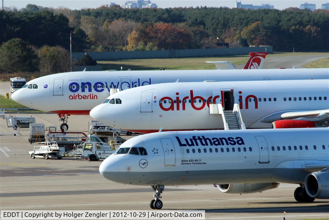 Tegel International Airport (closing in 2011), Berlin Germany (EDDT) - Two are resting, one in motion......
