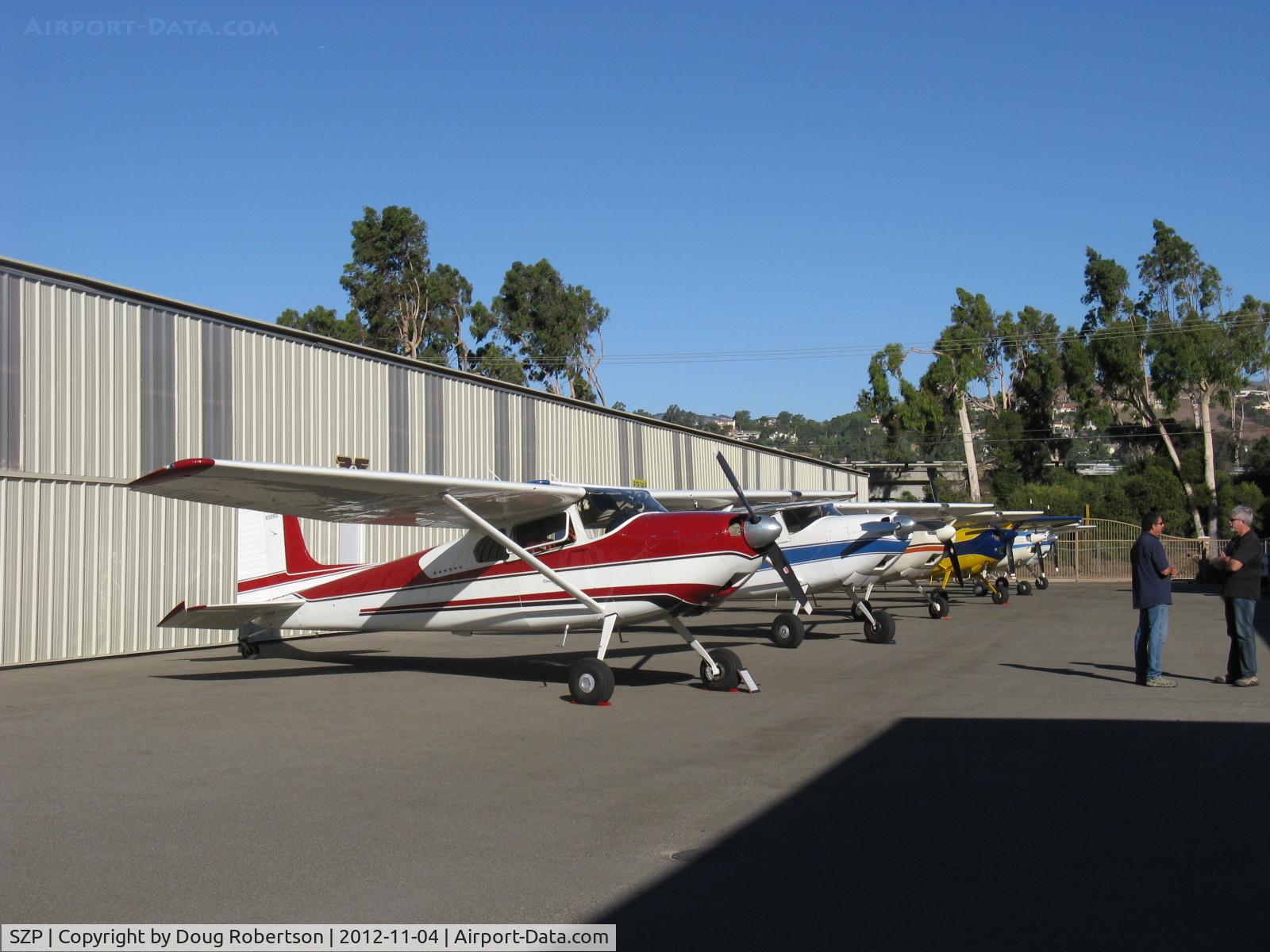 Santa Paula Airport (SZP) - Five Cessna 180s and a Cessna A185 on display at the Aviation Museum of Santa Paula taxiway. Aircraft displays change every First Sunday Fly-In and Open Museum Hangars crawl