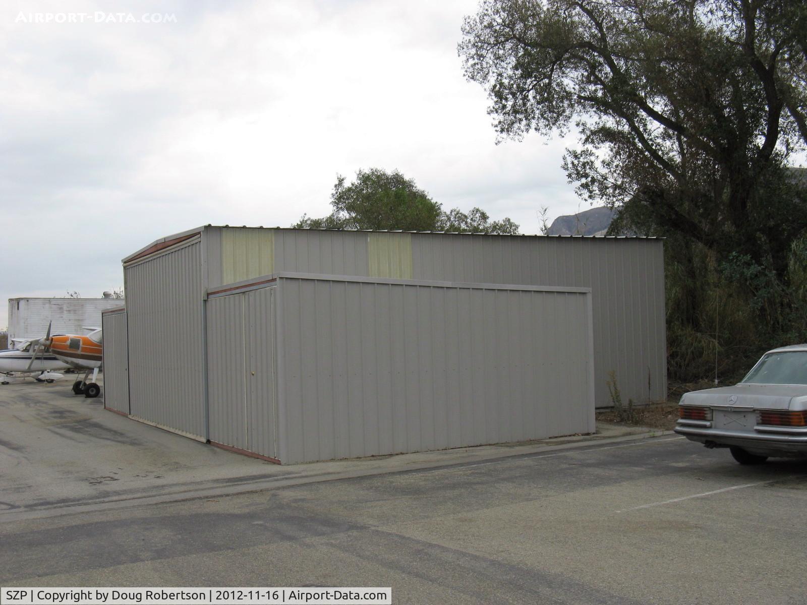 Santa Paula Airport (SZP) - PORT-A-PORT Mobile Aircraft 'TEE' Hangar. Cessna inside.