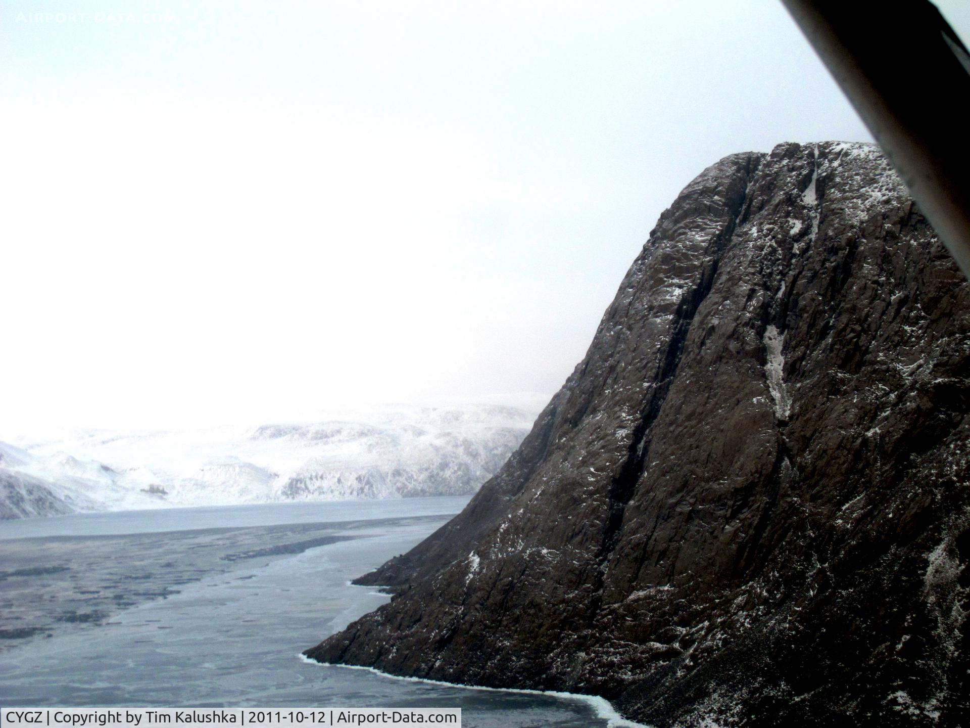 Grise Fiord Airport, Grise Fiord, Nunavut Canada (CYGZ) - Now on the outbound heading after the overshoot for runway 32. Check out the mountains!
