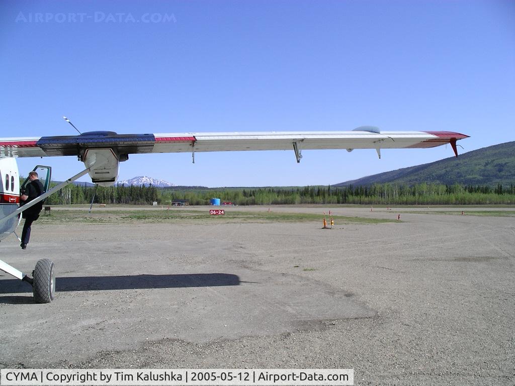 Mayo Airport, Mayo, Yukon Canada (CYMA) - Looking towards the runway from the apron area at Mayo. The runway is now 07/25 orientation.