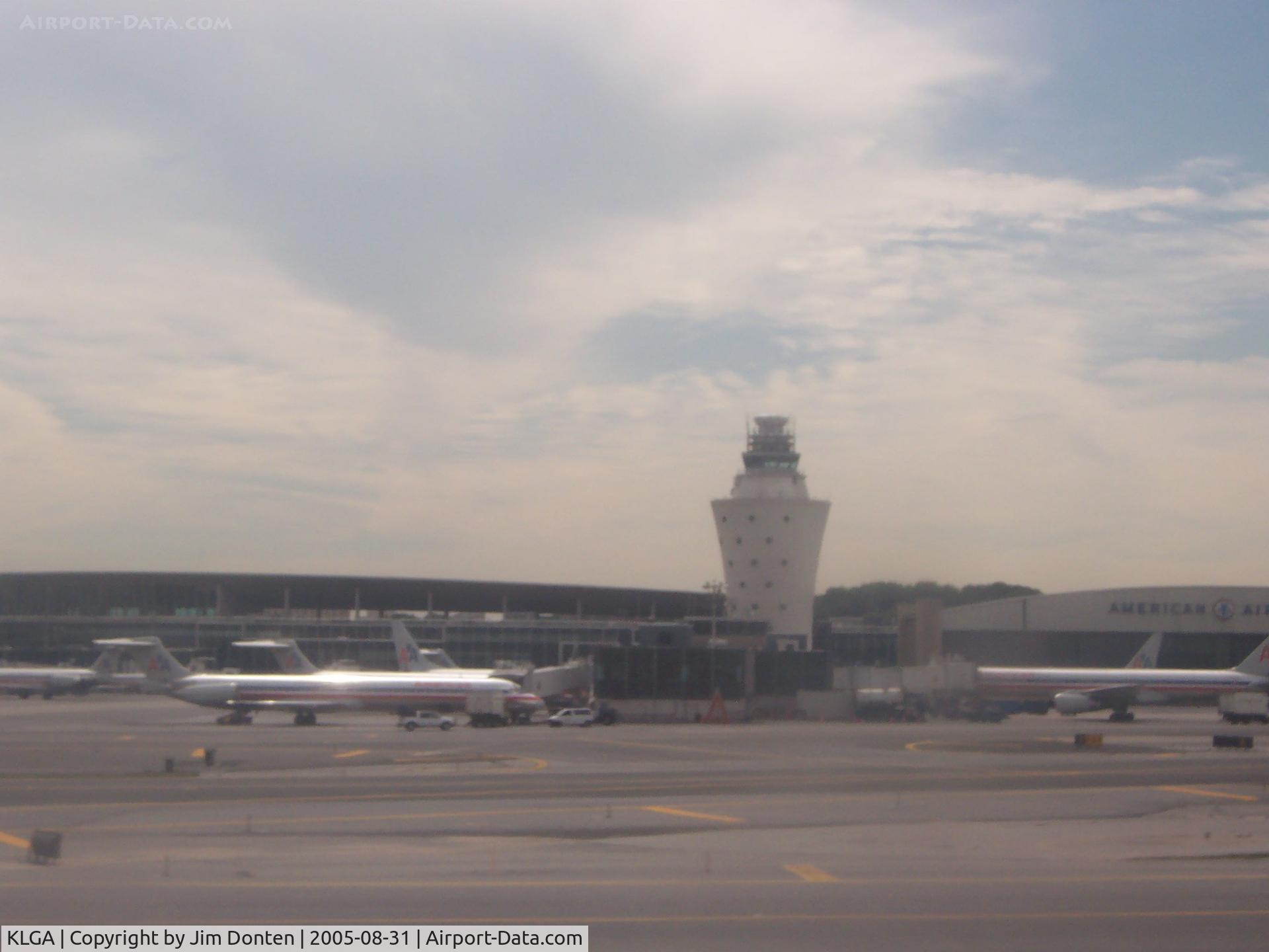 La Guardia Airport (LGA) - LaGuardia terminal through the window of an arriving flight