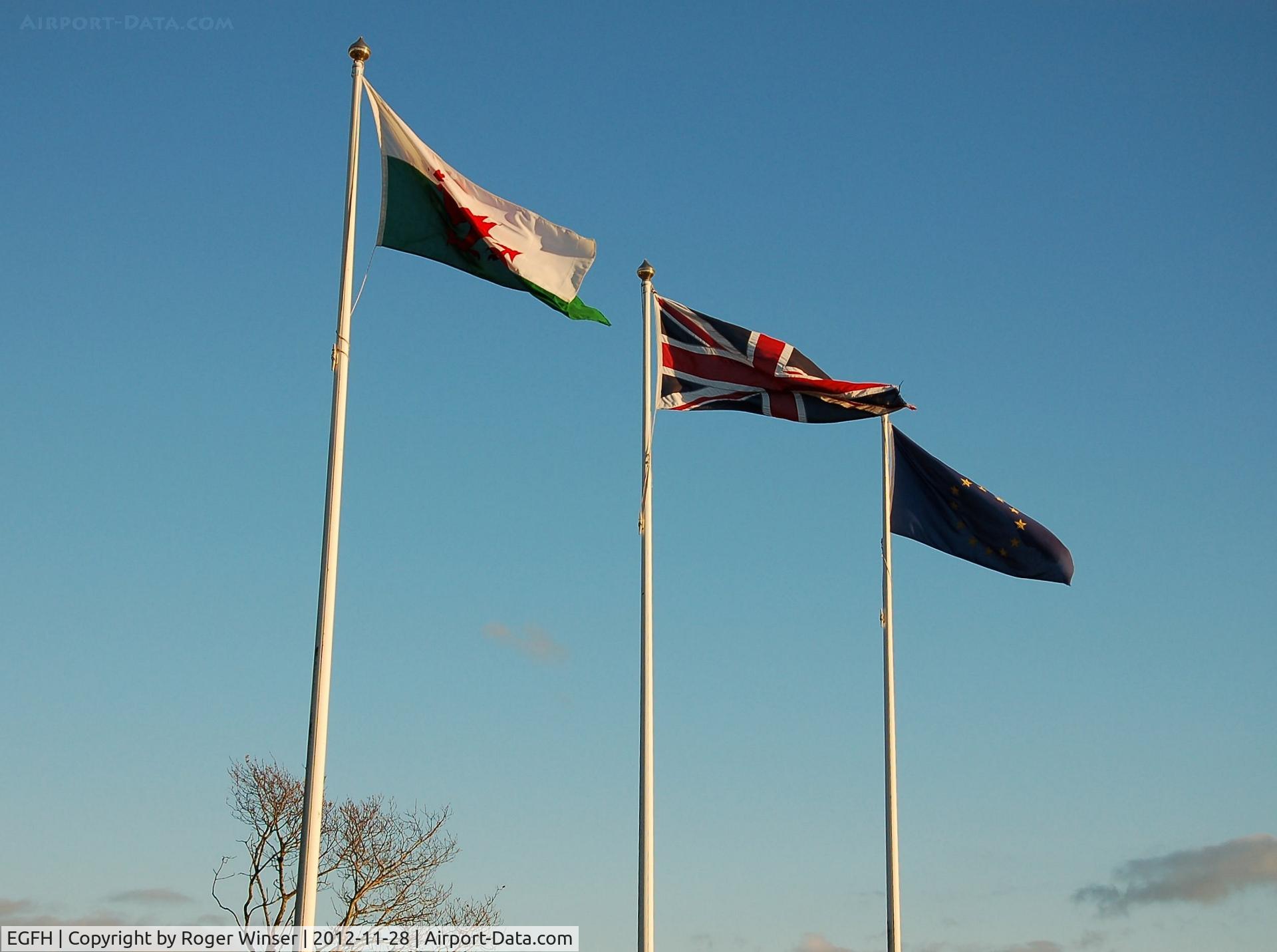 Swansea Airport, Swansea, Wales United Kingdom (EGFH) - Flags at the entrance to Swansea Airport. November 2012.