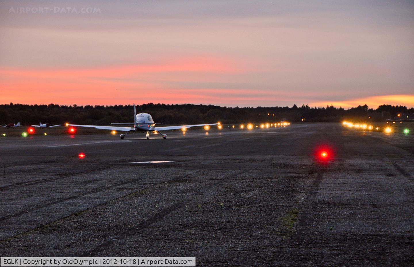 Blackbushe Airport, Camberley, England United Kingdom (EGLK) - take-off RW25 at dusk