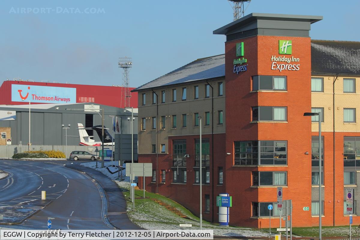 London Luton Airport, London, England United Kingdom (EGGW) - View of the Holiday Inn Express at Luton - and its proximity to the Signaure Bizjet ramp