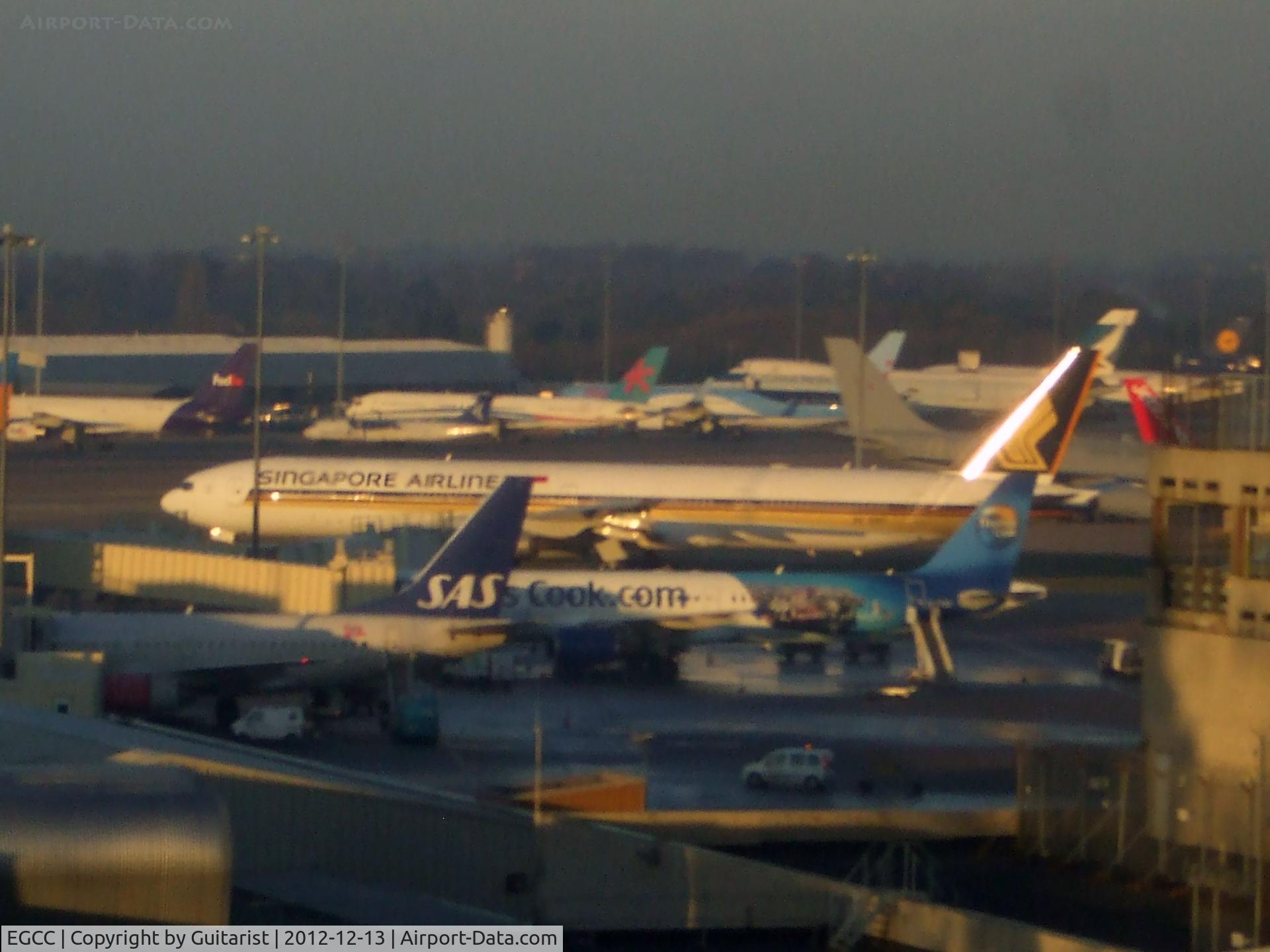 Manchester Airport, Manchester, England United Kingdom (EGCC) - Looks quite busy from this angle
