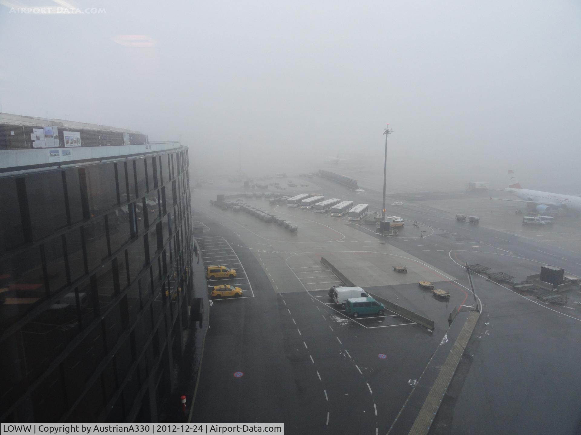 Vienna International Airport, Vienna Austria (LOWW) - On the left side the new Skylink-Terminal.
On the right side the old Terminal 2.
