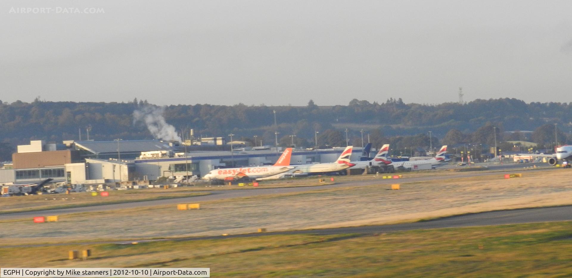 Edinburgh Airport, Edinburgh, Scotland United Kingdom (EGPH) - Edinburgh airport taken from the train while on my way to Leuchars