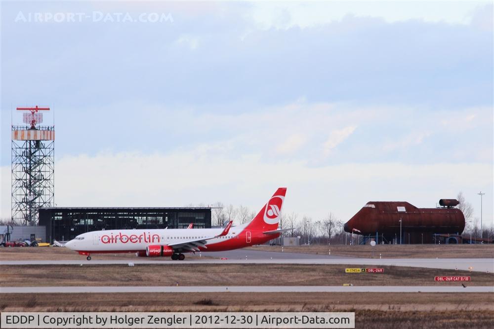 Leipzig/Halle Airport, Leipzig/Halle Germany (EDDP) - Outbound traffic on rwy 26R in front of Fire Training Center....