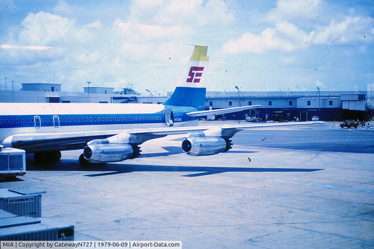 Miami International Airport (MIA) - Former Pan Am N758PA Jet Clipper Resolute still with the P & W JT-4A straight turbojets, rare in 1979. Fuselage still exsts in Wetteren, Belgium as a closed restaurant. Shown parked on the old F concourse. Southeast operated FAR Part 129 until around 1981