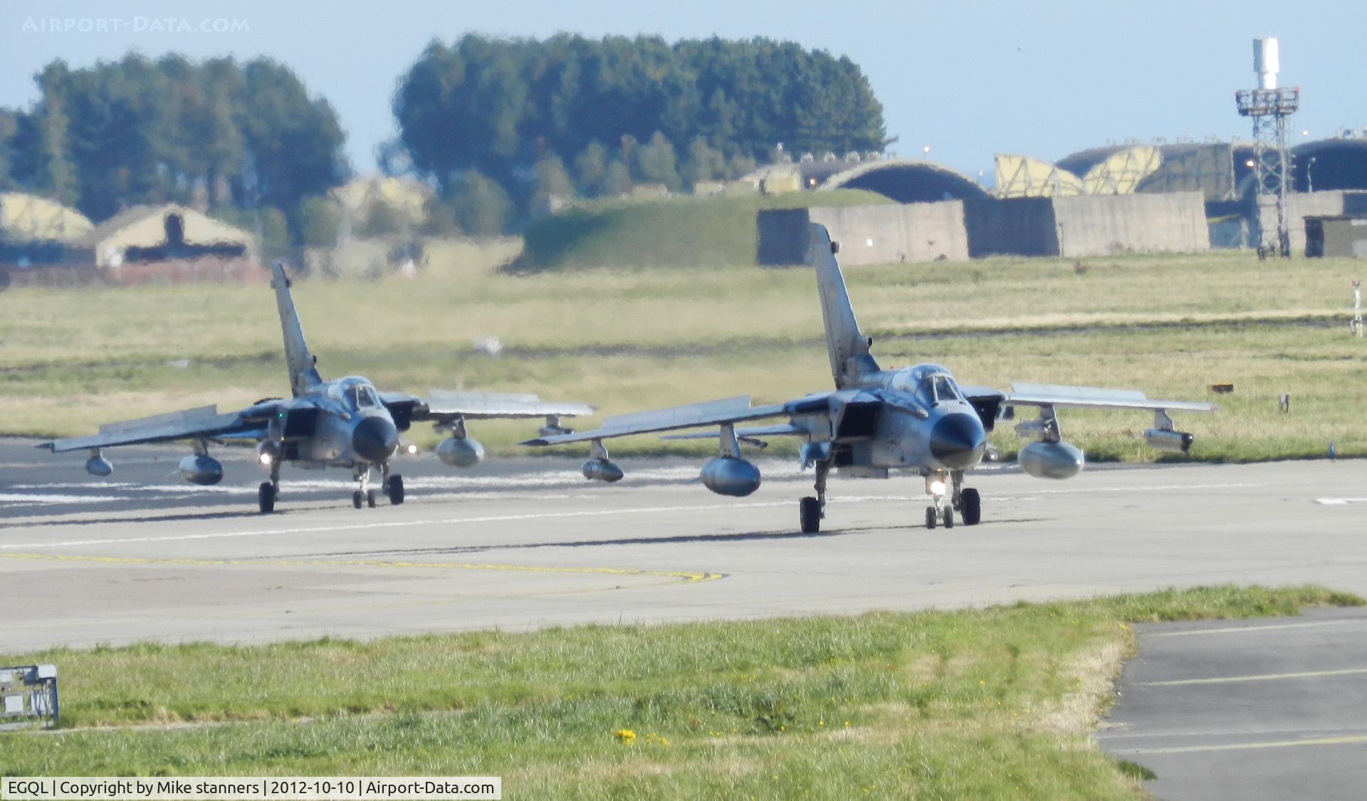 RAF Leuchars Airport, Leuchars, Scotland United Kingdom (EGQL) - A Pair of JBG-32 Tornado ECR's return to Leuchars after a joint warrior sortie,in the back ground the old 111sqn HAS Site can be seen ,where all the German Tornado's were housed during their 2 week deployment for exercise Joint warrior
