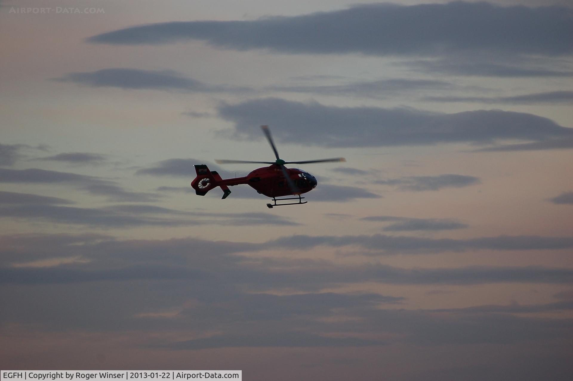 Swansea Airport, Swansea, Wales United Kingdom (EGFH) - Arriving at dusk.