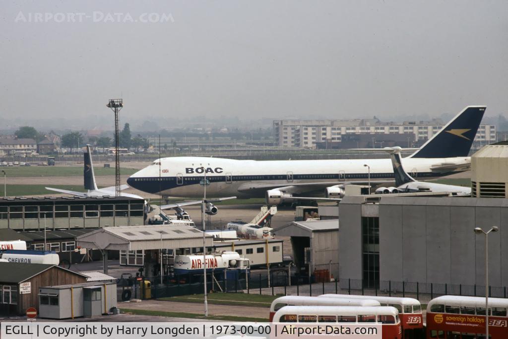 London Heathrow Airport, London, England United Kingdom (EGLL) - Seen from the roof of the Queens Building, Heathrow Airport in 1973, a BOAC 747-136 taxies past a BOAC VC10 Srs1101 and Boeing 707-436.