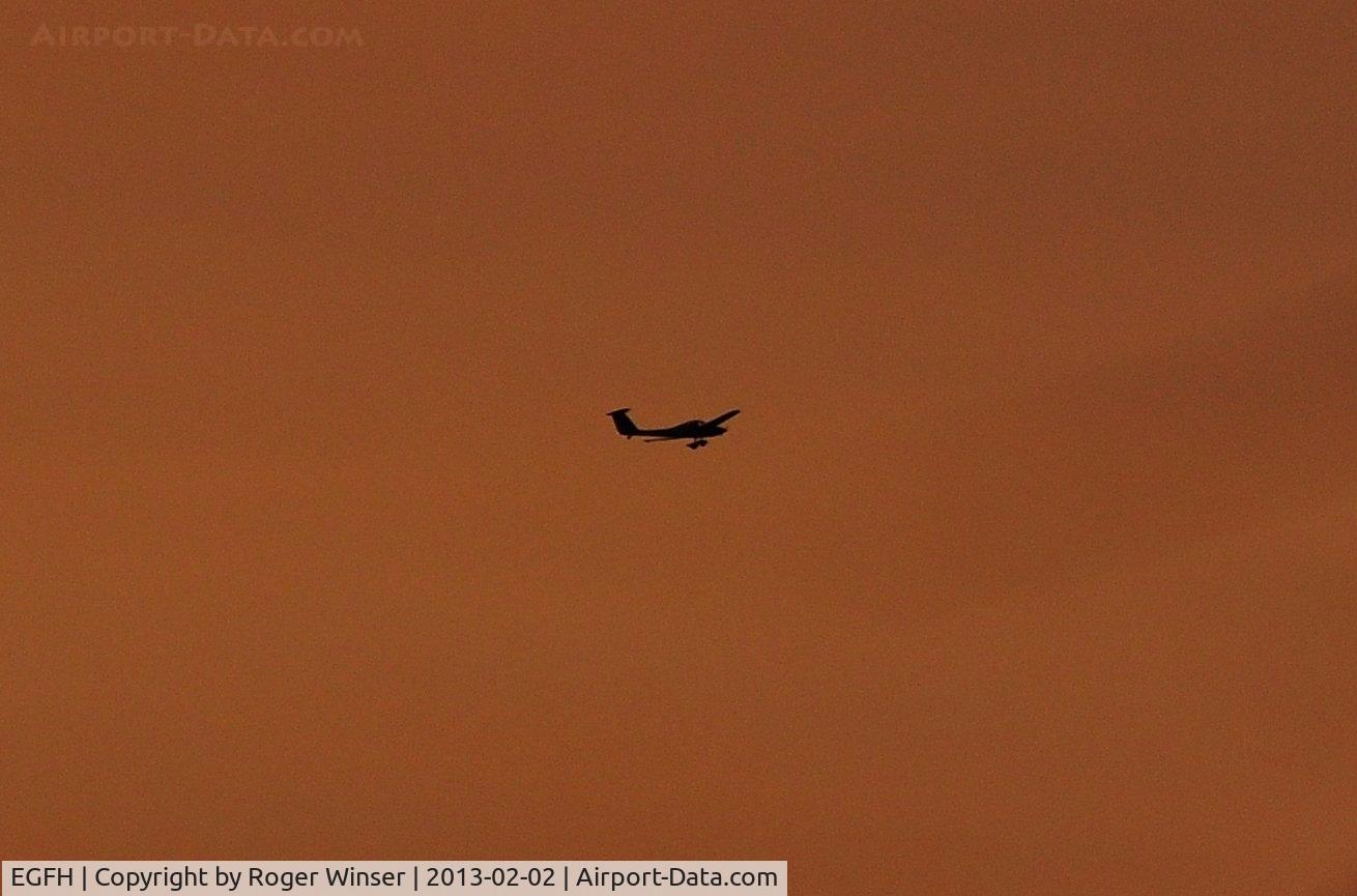 Swansea Airport, Swansea, Wales United Kingdom (EGFH) - Evening departure for a local flight.