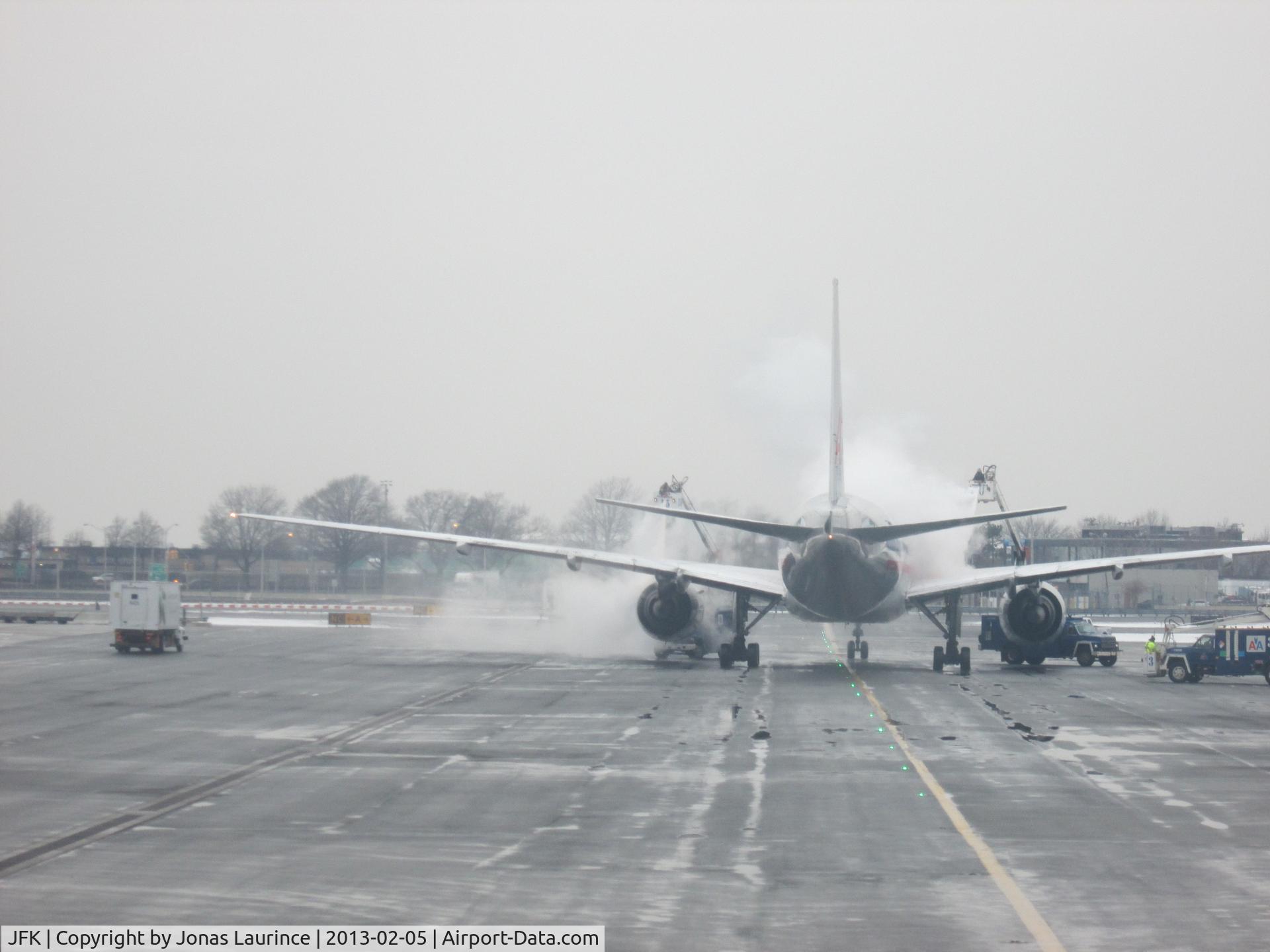 John F Kennedy International Airport (JFK) - An American Airlines Aircraft undergoing de-icing at John F Kennedy International Airport (JFK)