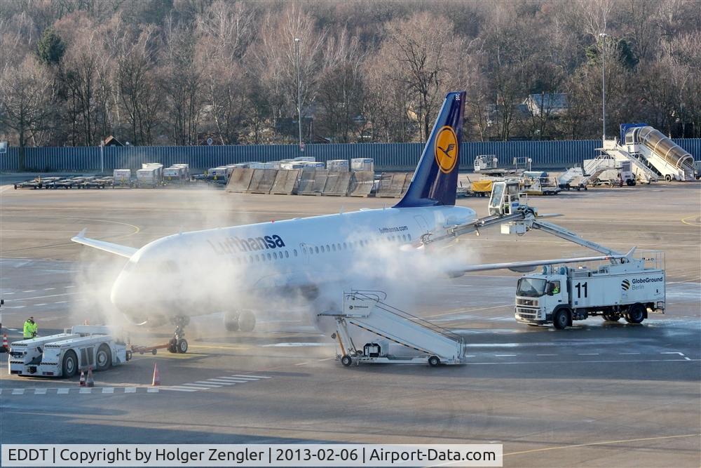 Tegel International Airport (closing in 2011), Berlin Germany (EDDT) - Deice ceremony after a cold night at TXL....