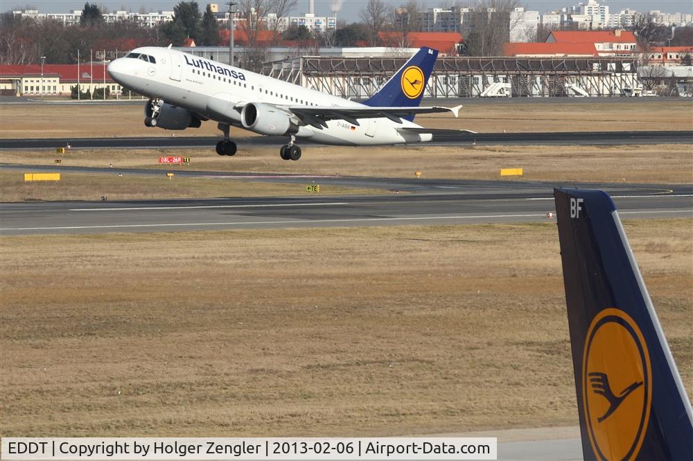 Tegel International Airport (closing in 2011), Berlin Germany (EDDT) - D-AIBA is leaving on rwy 26L when D-AIBF is getting prepared at stand 4 for a next task.....