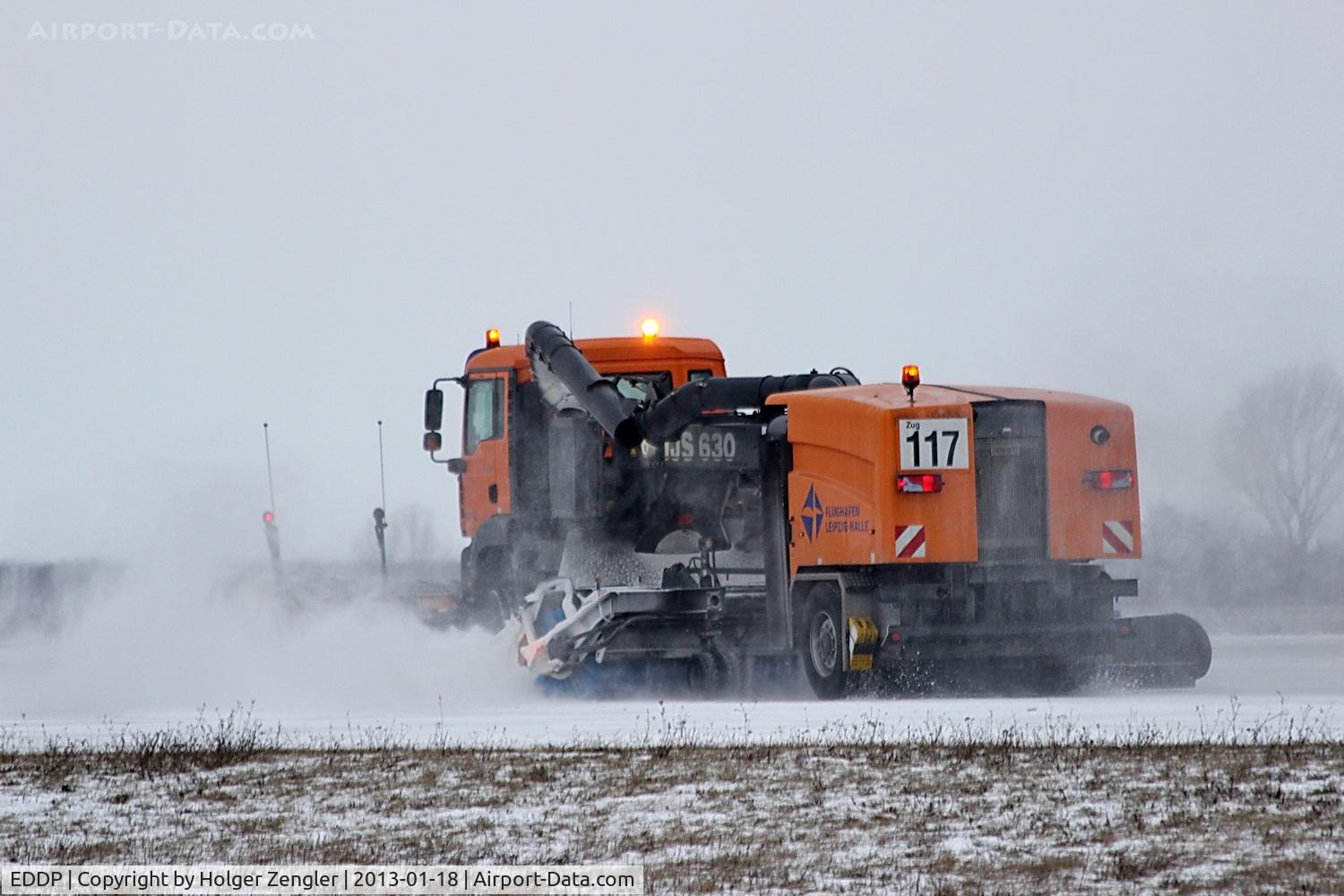 Leipzig/Halle Airport, Leipzig/Halle Germany (EDDP) - Twinkling snowplow no. 117 on duty......