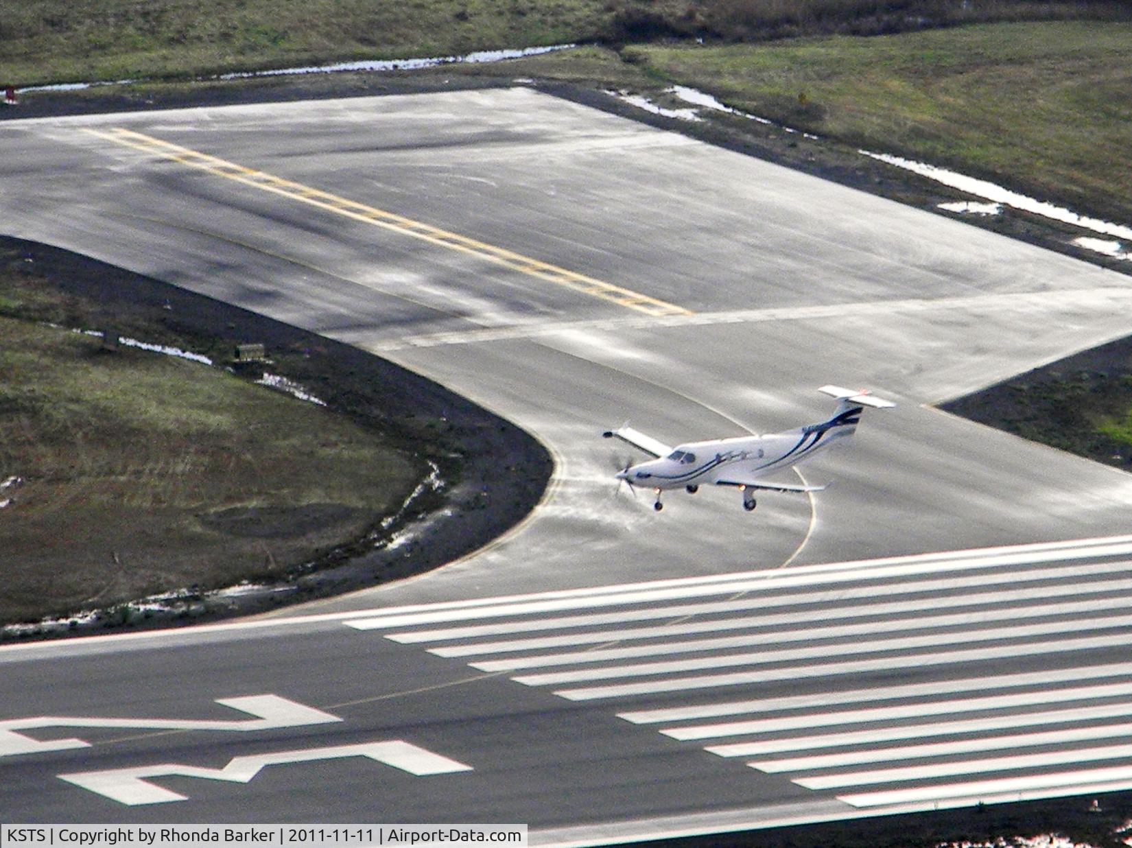 Charles M. Schulz - Sonoma County Airport (STS) - Small plane landing Runway 32 as seen from a hot air balloon

Photot With the permission of Rhonda Barker
