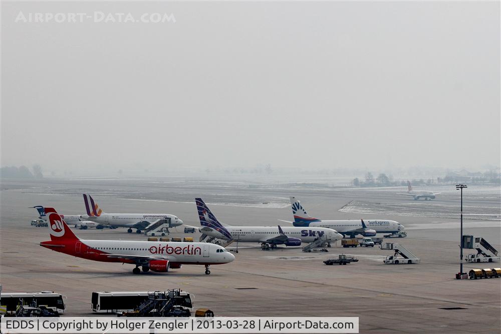 Stuttgart Echterdingen Airport, Stuttgart Germany (EDDS) - Five airlines and two busses....