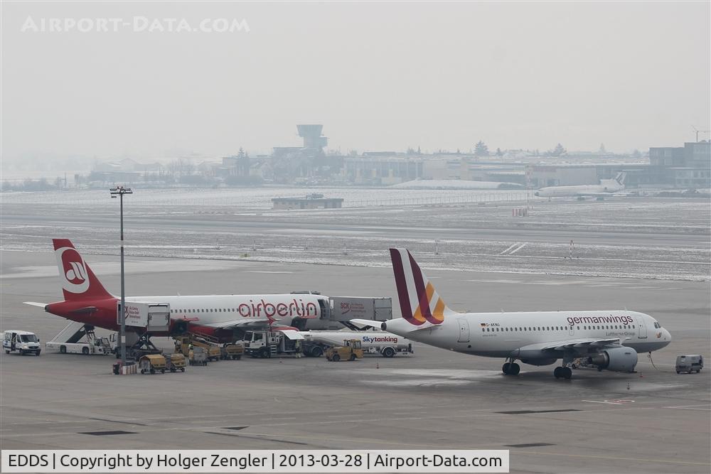 Stuttgart Echterdingen Airport, Stuttgart Germany (EDDS) - View from terminal building over apron and rwy 07/25 to tower, which is constructed out of airport area...