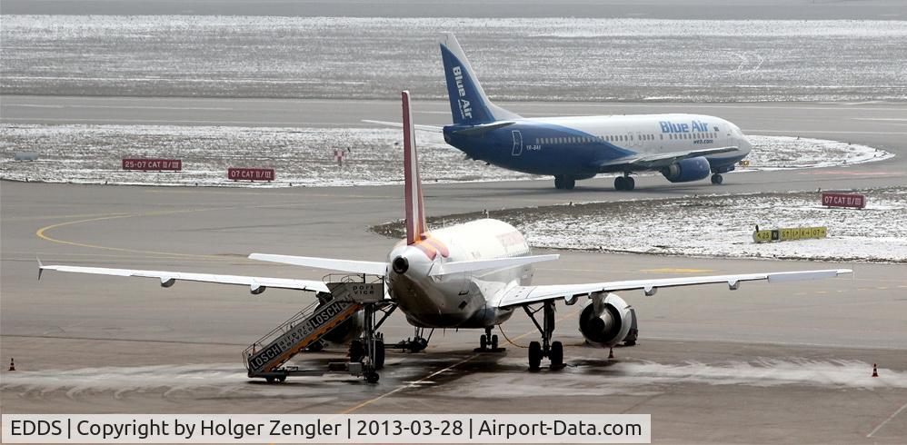 Stuttgart Echterdingen Airport, Stuttgart Germany (EDDS) - One is resting on apron west and one is lining up for take off on rwy 07....