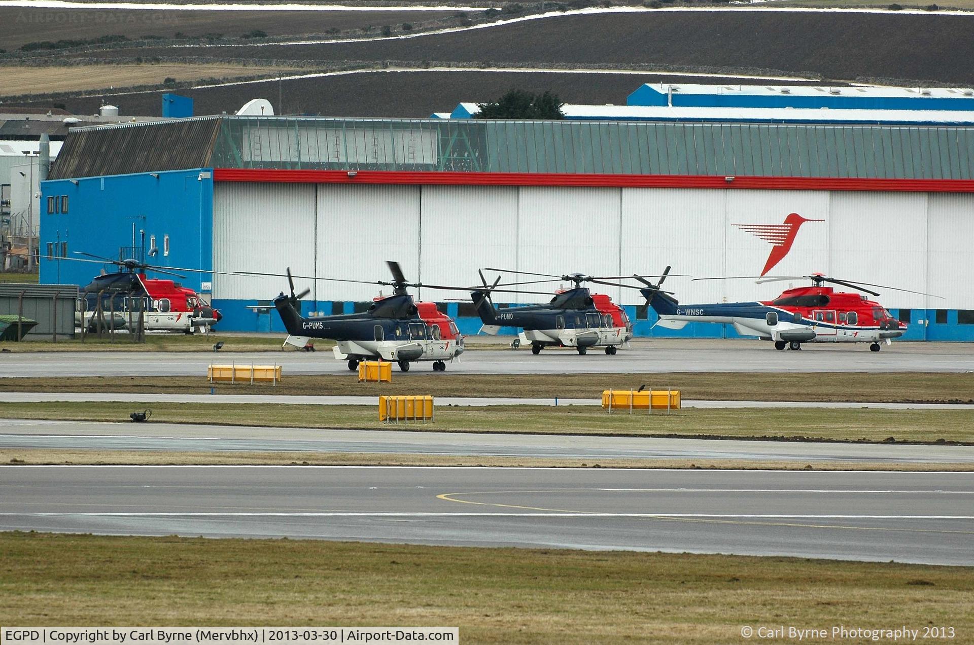 Aberdeen Airport, Aberdeen, Scotland United Kingdom (EGPD) - Some of CHC Scotia's fleet outside their hangar.